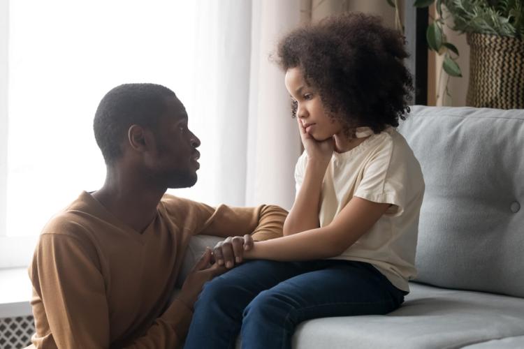 Picture of parent having a supportive conversation with child