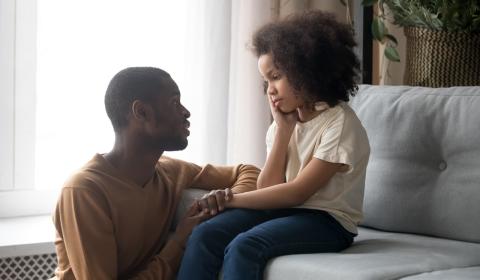 Picture of parent having a supportive conversation with child